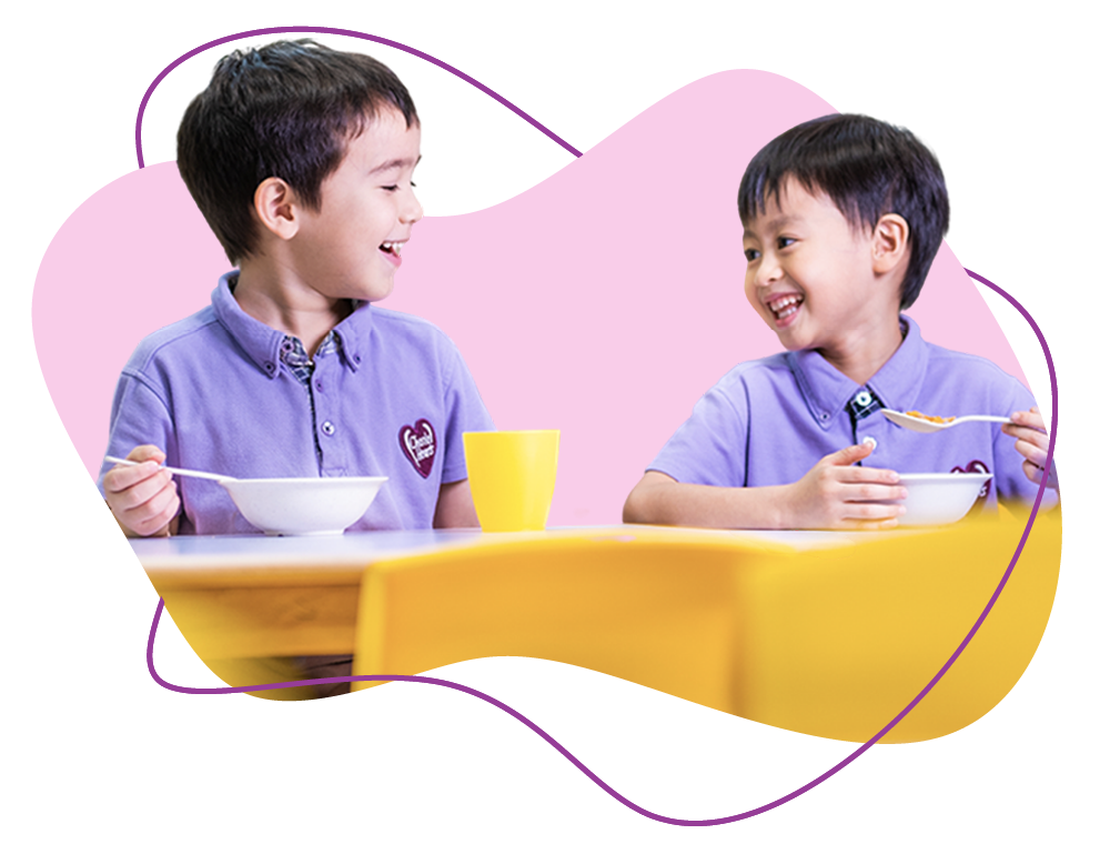 Children sharing a meal at Cherie Hearts