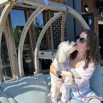 Our trainer with a dog at a cafe