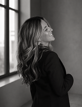 Portrait of a professional in a black blazer, editorial