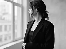 Editorial portrait of a professional in a black blazer