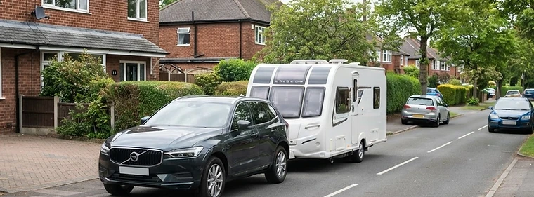 A UK tow vehicle collecting a touring caravan