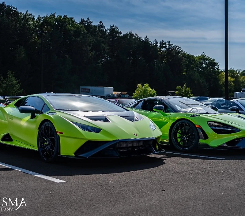 Red exotic vehicle in premium show placement