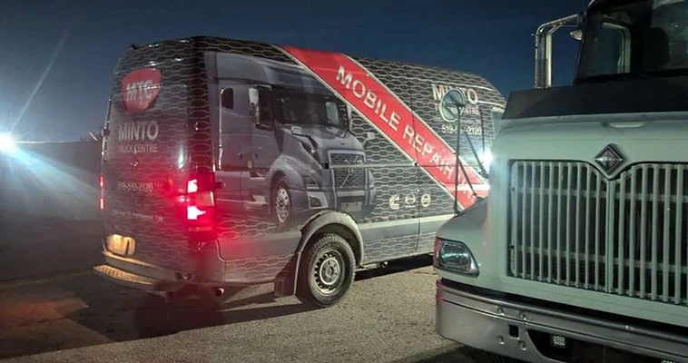Minto Truck Centre service van at night