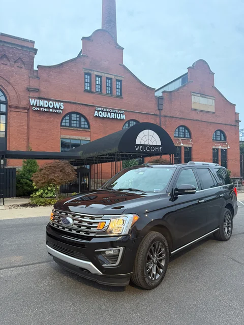 NEO Elite's black Ford Expedition outside Windows on the River and the Greater Cleveland Aquarium in the Flats, Cleveland