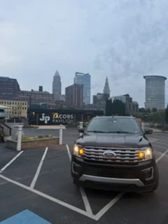 Ford Expedition at Jacobs Pavilion with the Cleveland skyline behind it