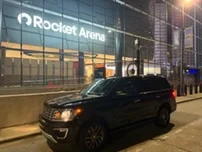 Black Ford Expedition outside Rocket Arena in downtown Cleveland at night