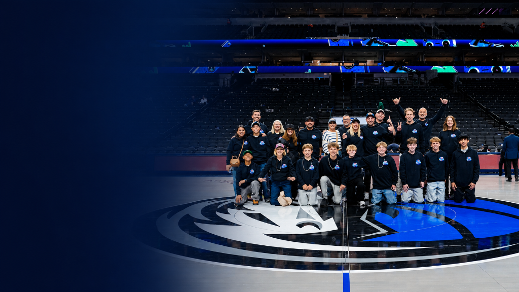 Dream Hoop Tours group on an NBA court
