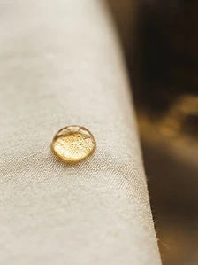 Macro texture — serum on silk