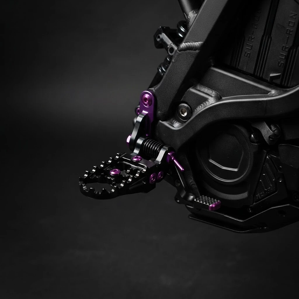 Carbon Void Foot Pegs — Surron LBX