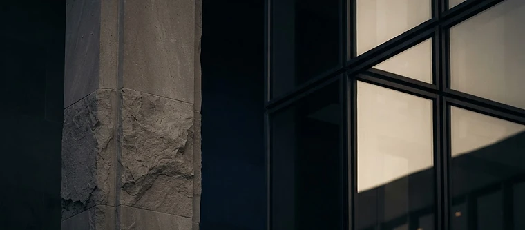 Architectural stone and glass symbolizing retirement structure