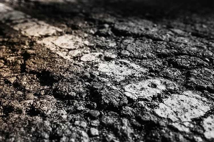 Aged asphalt with track lines