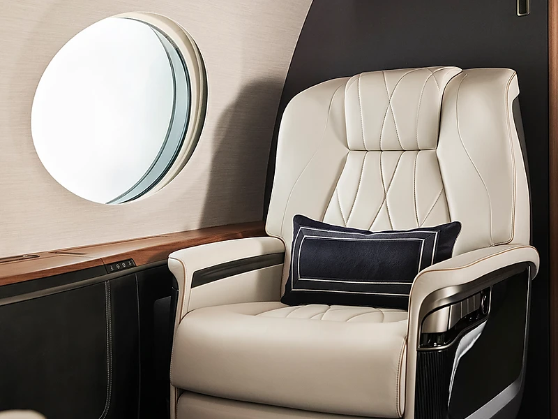 Luxury private jet cabin captain's seat with diamond-stitched leather