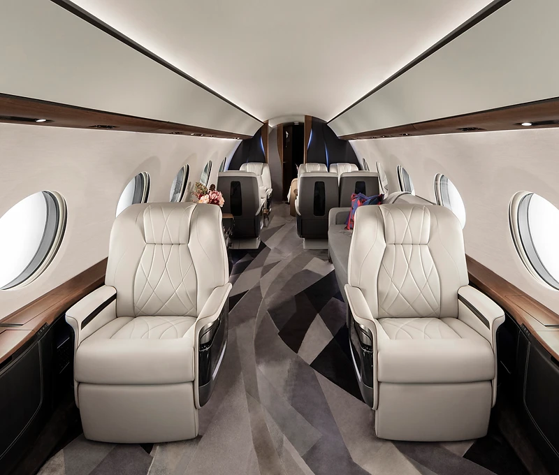 Private jet cabin interior in flight