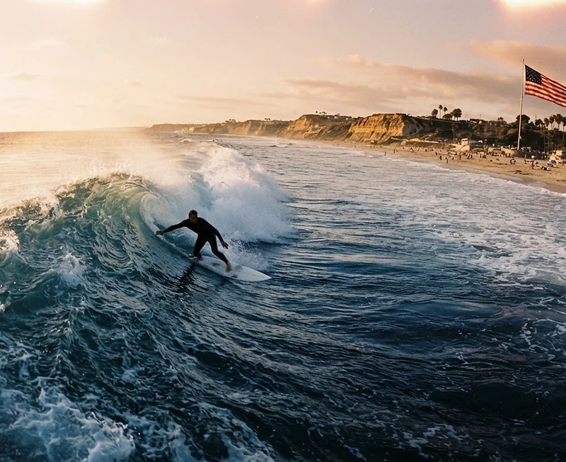 Surfer carving a wave in San Diego