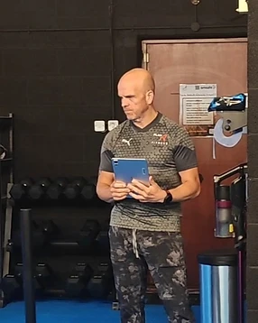 Alex Percival coaching on the gym floor at Plan-A, Bury