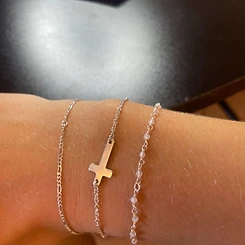 Permanent jewelry with charm welded by Oh She Linked