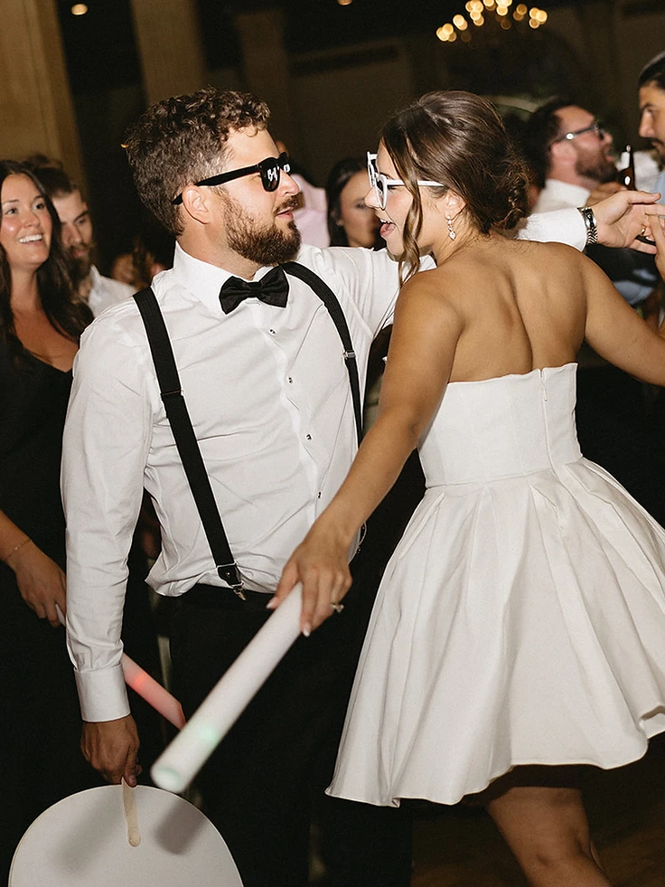 Brittany and Ryan dancing on the reception floor as the nightclub-style lighting takes over the Persian Terrace