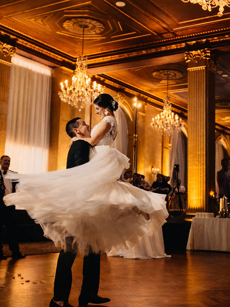 Kristin and Corey's choreographed first dance in the Persian Terrace, her tulle skirt fanned out in a lift