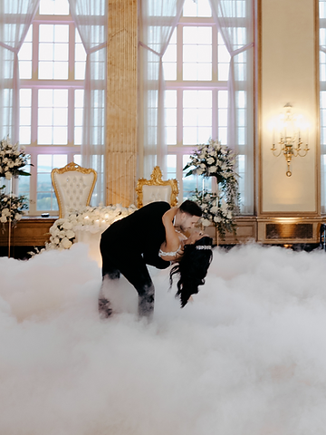 Svetlana and Konstantin in a dip surrounded by low-lying dancing on the clouds in the Grand Ballroom