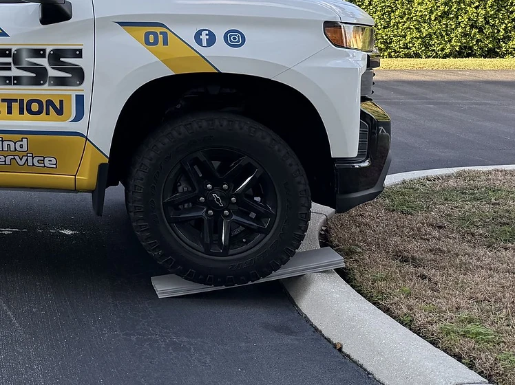 7 ton truck parked on a Fortress Flood Protection aluminum plank, demonstrating strength