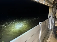 Fortress flood barrier holding back floodwater during a hurricane