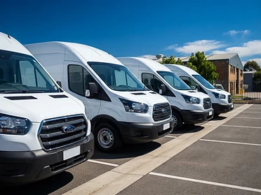 Multiple clean commercial fleet vehicles in a row
