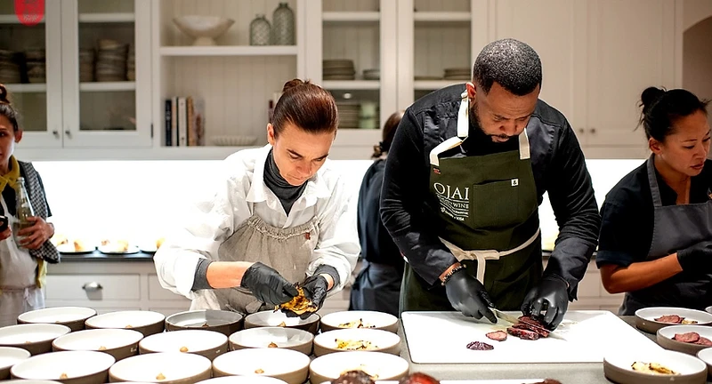 Chefs plating in the kitchen