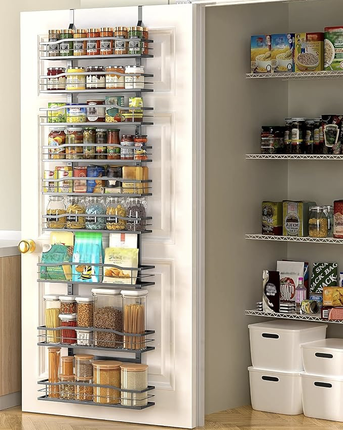 Over-the-door pantry organizer rack filled with jars, spices, and snacks