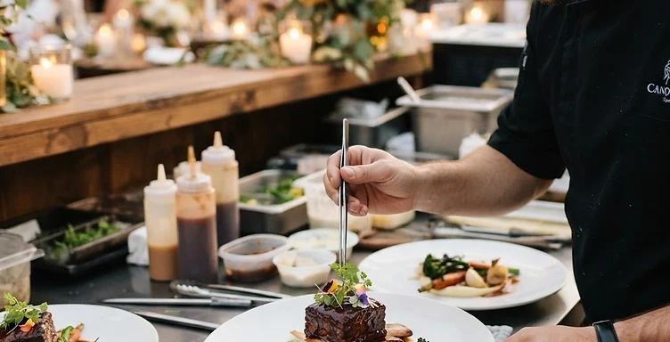 CHEF ALEC FINISHING PLATES ON SITE — LIVE WEDDING SERVICE
