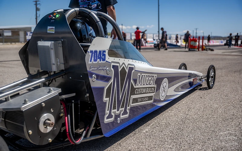Spectators watching racing from trackside at Top Gun Dragstrip