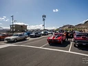 Race cars and crews assembled in the staging lanes at Top Gun Dragstrip