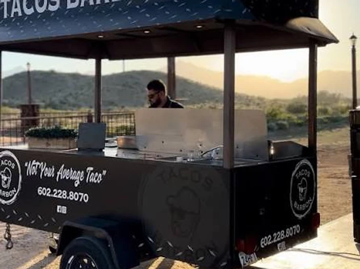 The original Tacos Barbon food cart in Verrado at dusk