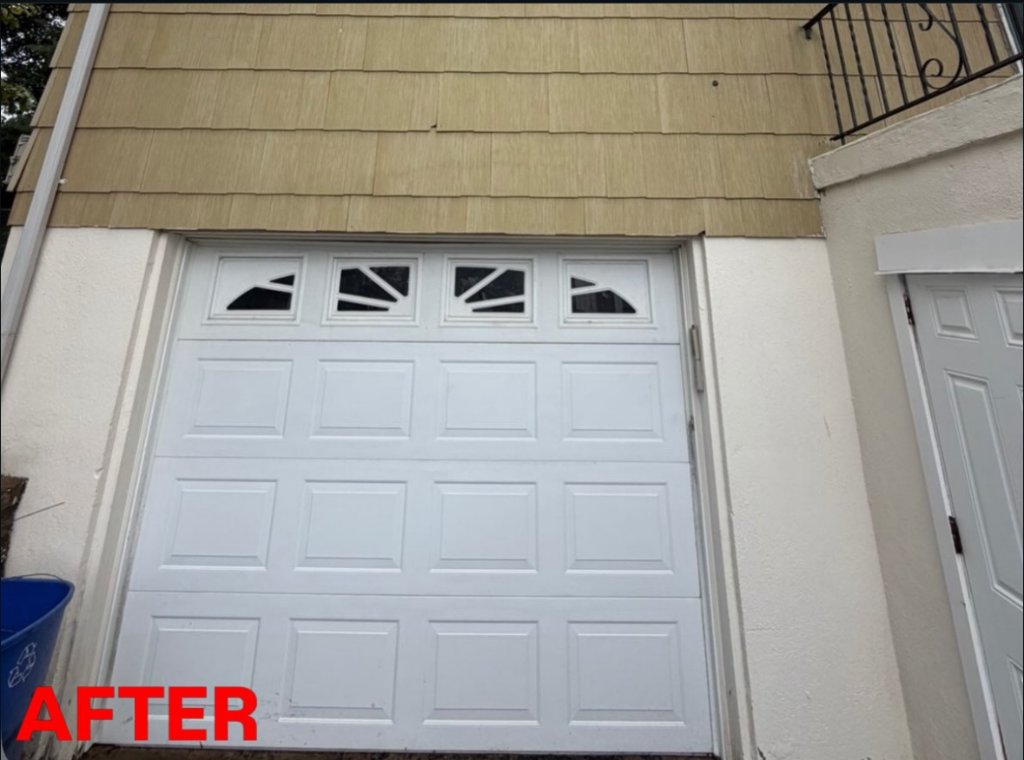 Same garage entry with bright white door, clean stucco, and restored cedar shingles after washing by Apex Property Services