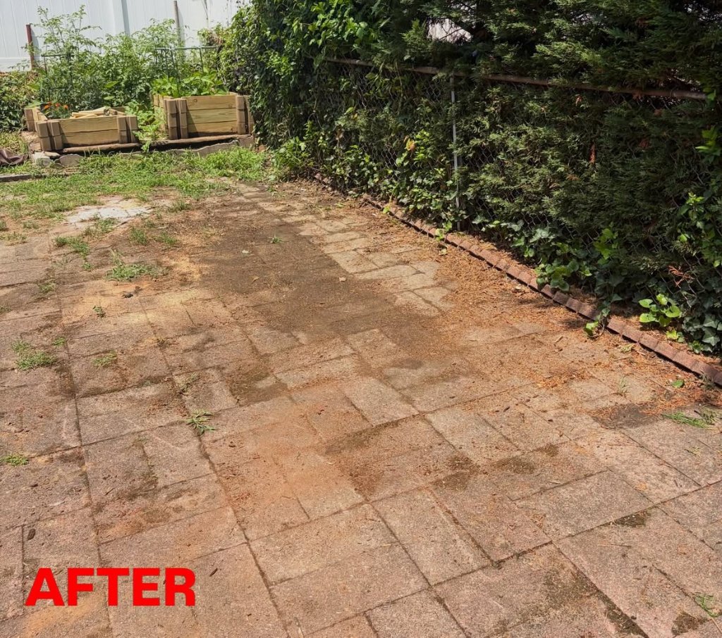 Same brick paver patio fully cleared and swept after deck demolition and debris haul-away by Apex Property Services
