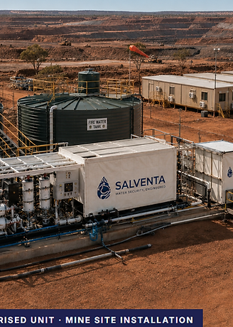 Salventa containerized water treatment unit shown beside raw and fire water tanks