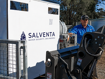 Salventa trailer unit maneuvered by forklift with operator for scale