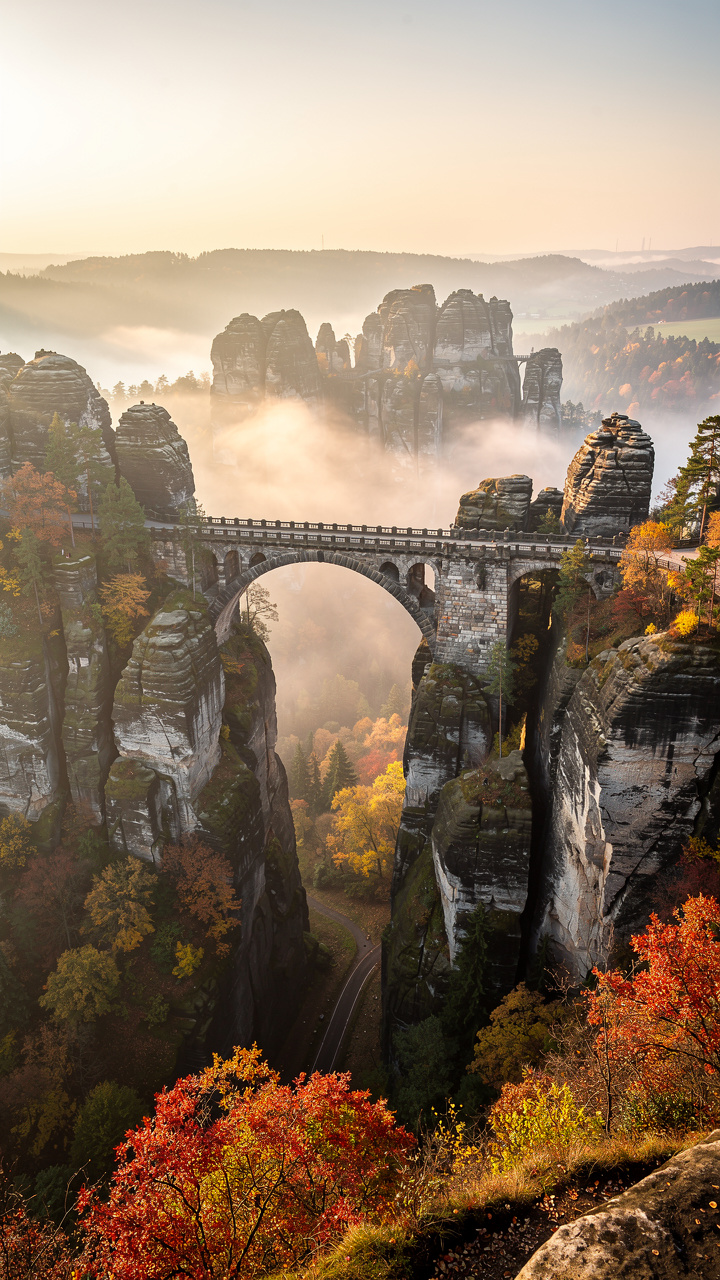 The Bastei Bridge is best visited in the early morning light to capture the magical mist.