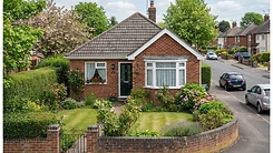 A modest British bungalow with a small garden