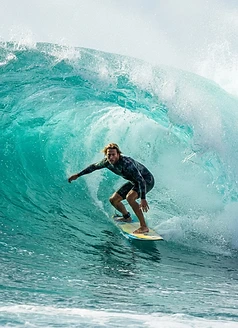 Surfer on a North Shore wave
