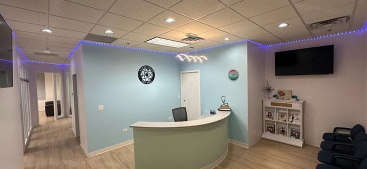 AtomicMedX clinic reception area in Naperville, IL