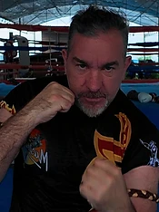 Kru Sam in fighting stance at Bangkok gym