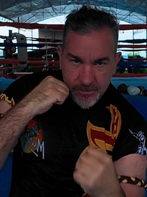Kru Sam in fighting stance at Bangkok gym