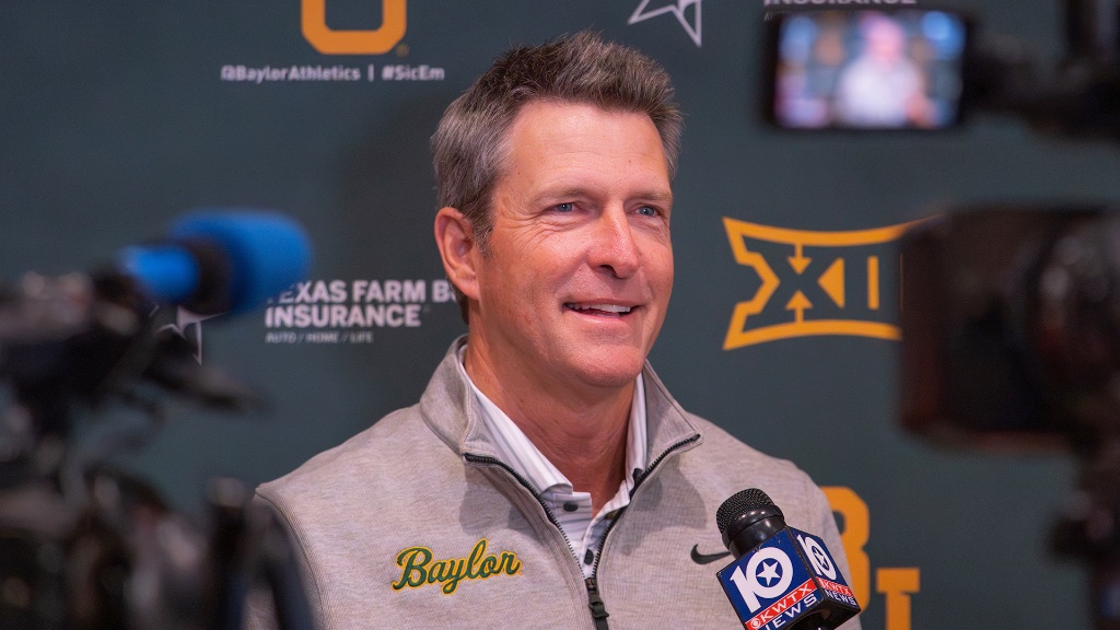 College coach at press conference
