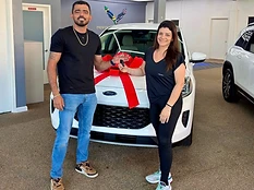 Thallyta A. receiving their vehicle