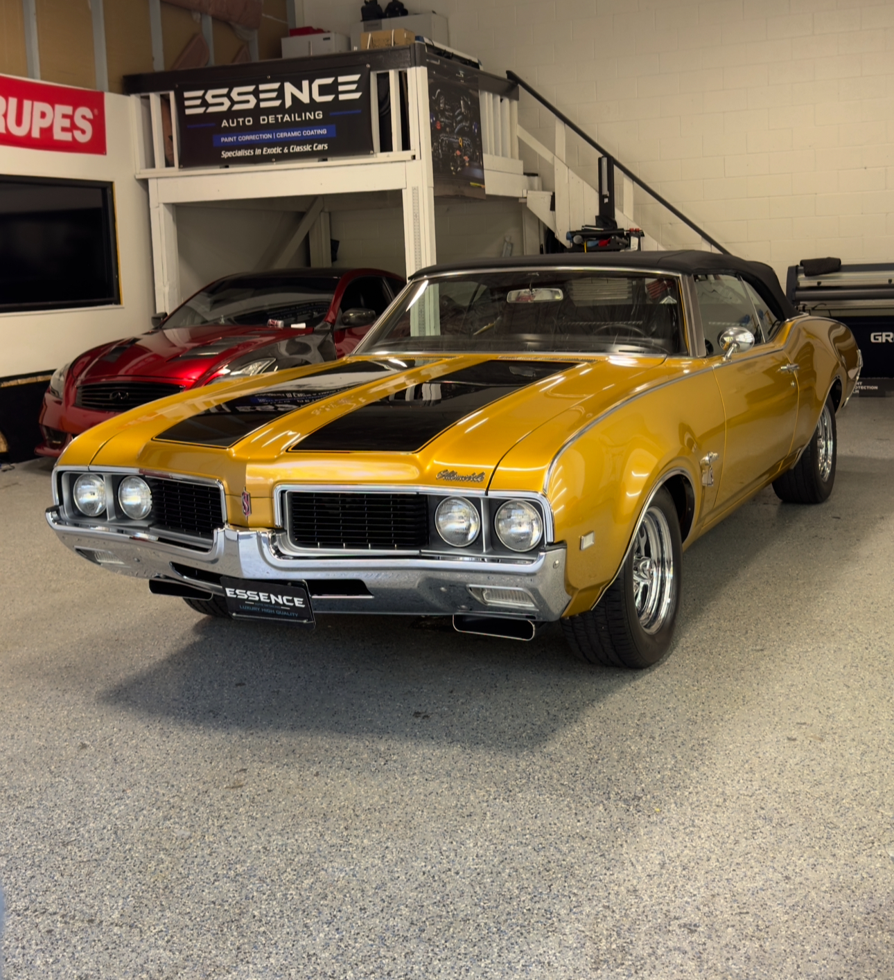 Gold convertible classic car in the Essence studio