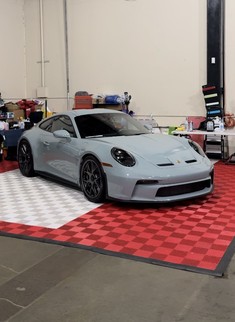 Chalk grey Porsche 911 GT3 in workshop