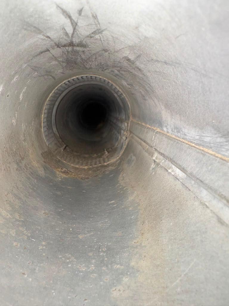Dryer vent interior after lint removal.