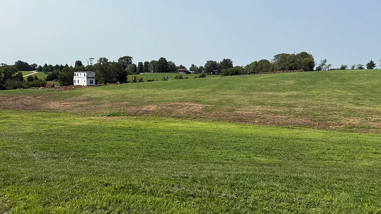 Wide view of rolling Northland Missouri acreage after brush clearing by Triple M Excavation