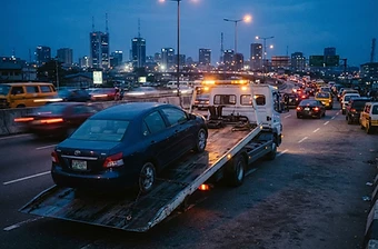 RoadAid tow truck on an Abuja expressway