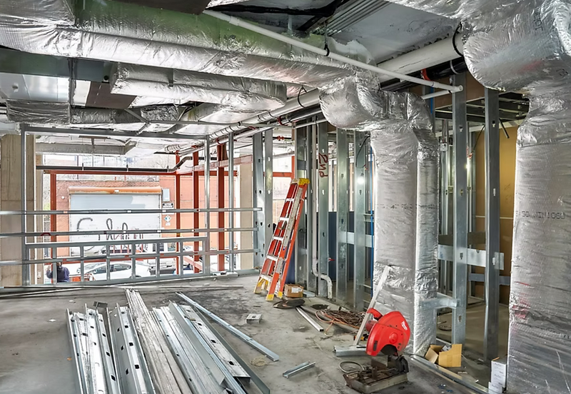 Commercial rooftop HVAC ductwork installed during a North Jersey build-out